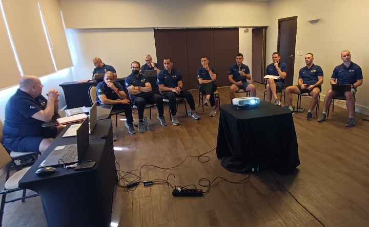 Referees in a Pre-Competition Camp meeting.